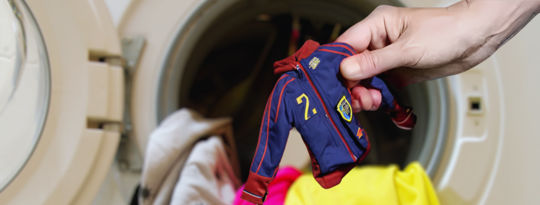 Small shrunken jacket taken out of a washing machine to illustrate shrinkage risk