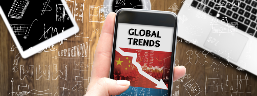 Phone screen showing global trends with charts and arrows for activewear market insights